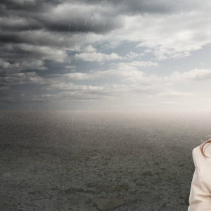 Woman Looking at a Storm