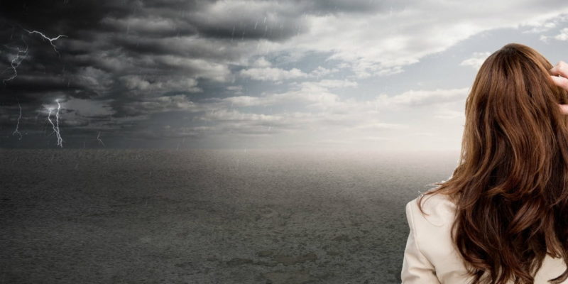 Woman Looking at a Storm