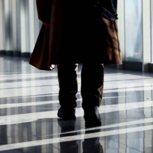 Man Walk Through Glass